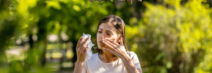 Preparing for Spring Allergy Season:Woman suffering with Allergies