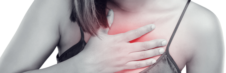 Woman with symptomatic acid reflux or heartburn, isolated on white background