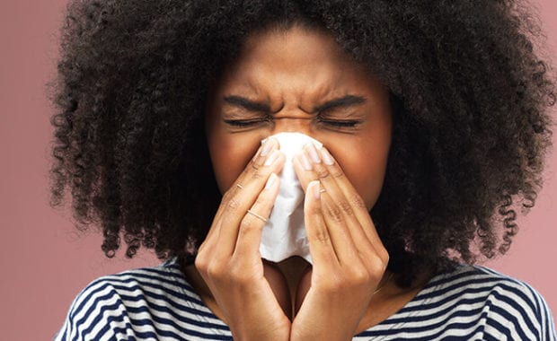 Girl Sneezing